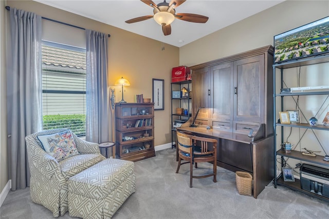 carpeted office with ceiling fan