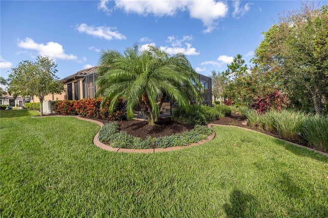 view of yard with a lanai