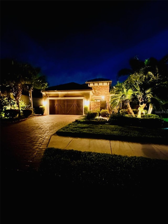 view of front of property with a garage