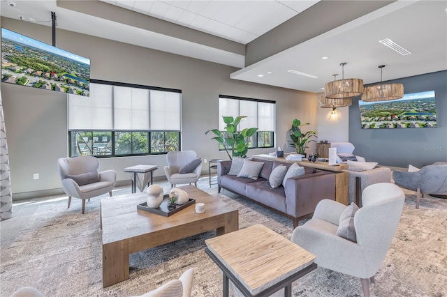 living room featuring plenty of natural light and carpet floors