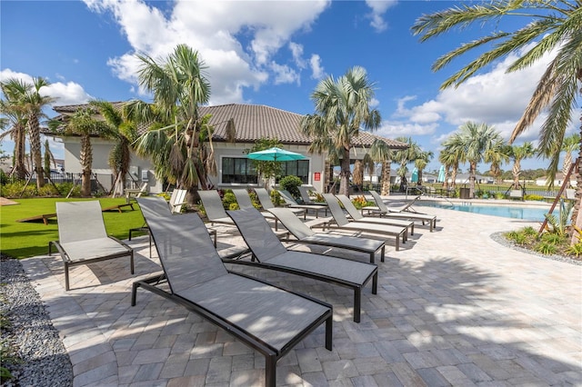 view of patio / terrace featuring a community pool