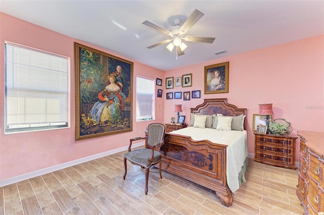 bedroom featuring ceiling fan and light hardwood / wood-style floors