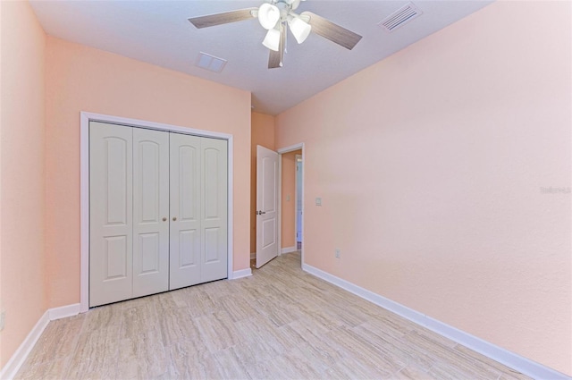 397 Doniphan Dr, Port Charlotte, FL 33954 - unfurnished bedroom featuring light wood-style floors and baseboards
