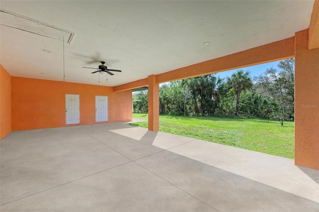 view of patio featuring ceiling fan