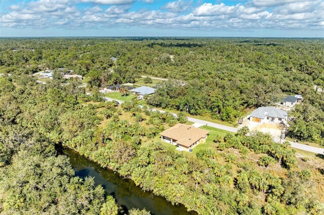 397 Doniphan Dr, Port Charlotte, FL 33954 - drone / aerial view of a heavily wooded area