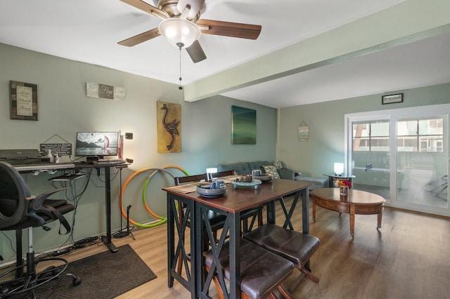 dining room featuring light hardwood / wood-style flooring and ceiling fan