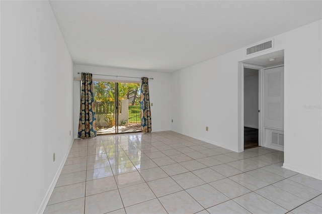 view of tiled spare room