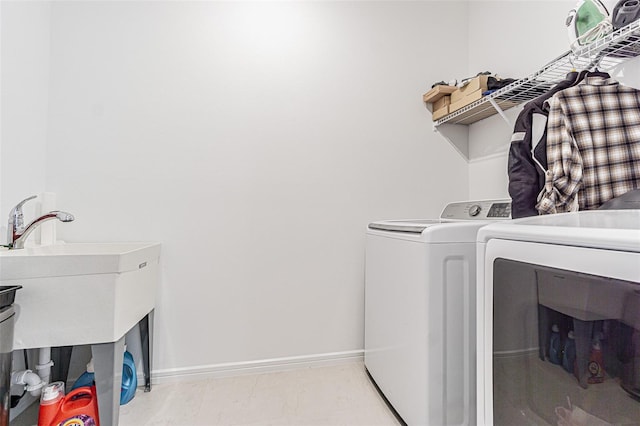 laundry area with washer and clothes dryer