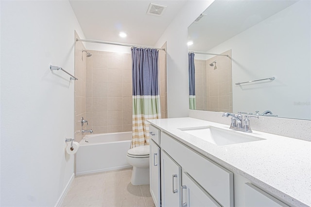 full bathroom with tile patterned flooring, vanity, shower / tub combo, and toilet