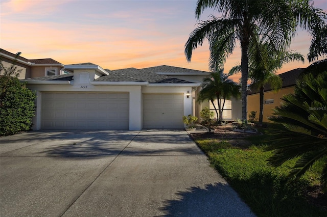 view of front of property featuring a garage