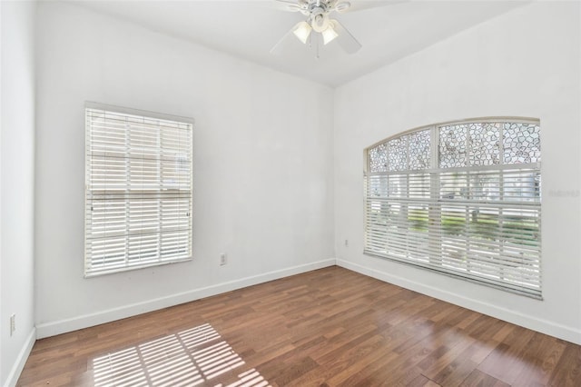 spare room featuring ceiling fan and hardwood / wood-style floors