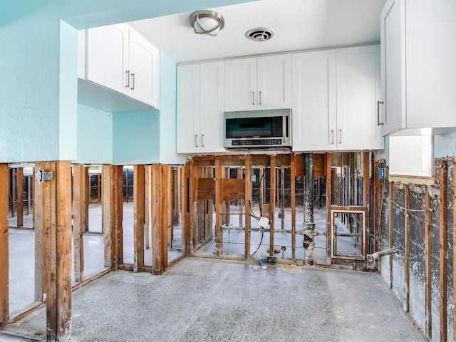 kitchen with white cabinets