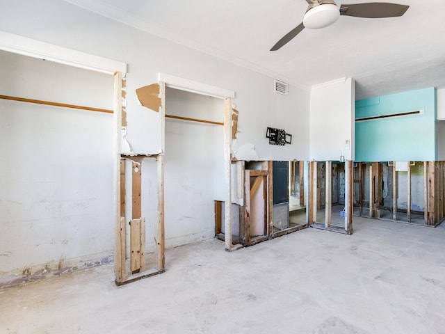 unfurnished bedroom with ceiling fan and ornamental molding