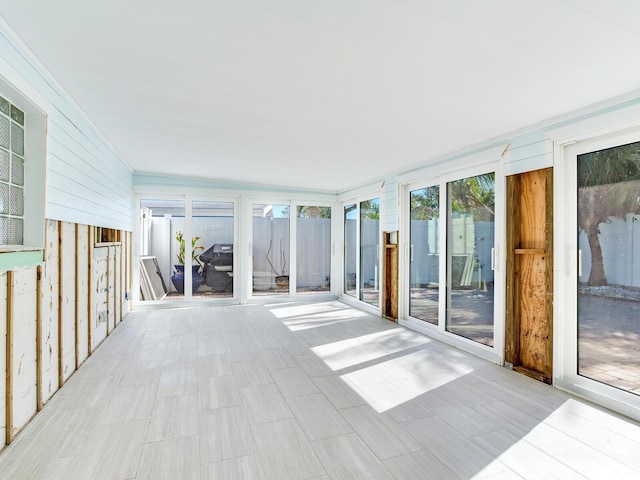 view of unfurnished sunroom