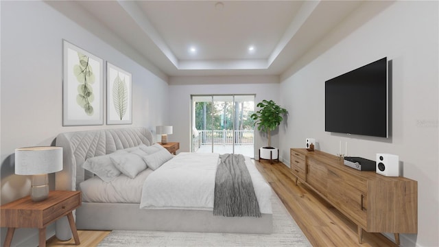 bedroom with access to exterior, light wood-type flooring, a raised ceiling, and recessed lighting