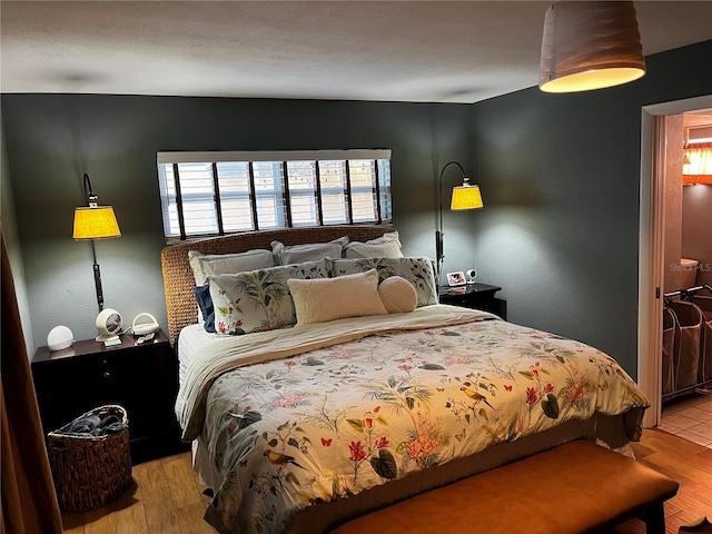 bedroom featuring light wood-type flooring