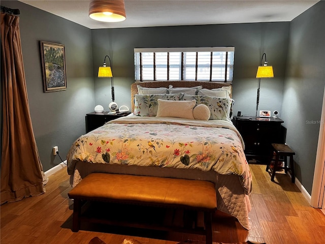 bedroom with light hardwood / wood-style floors