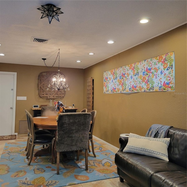 dining room with recessed lighting, visible vents, baseboards, and an inviting chandelier