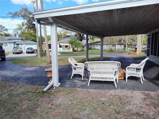 view of patio / terrace featuring a garage