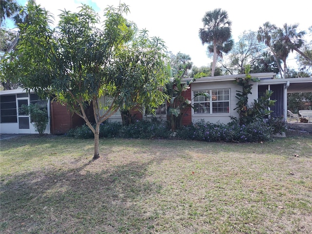 view of yard featuring a carport