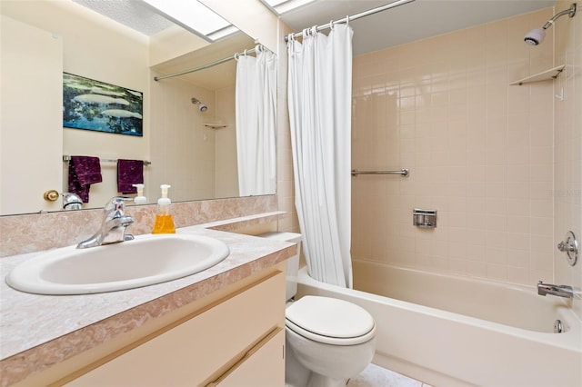 full bathroom with vanity, shower / bath combination with curtain, and toilet