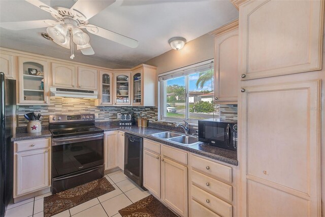 kitchen featuring ceiling fan, sink, decorative backsplash, light tile patterned flooring, and black appliances