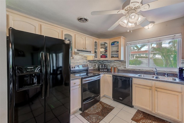 kitchen featuring ceiling fan, sink, tasteful backsplash, light tile patterned floors, and black appliances