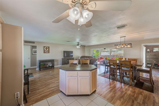 kitchen featuring light wood-type flooring and ceiling fan