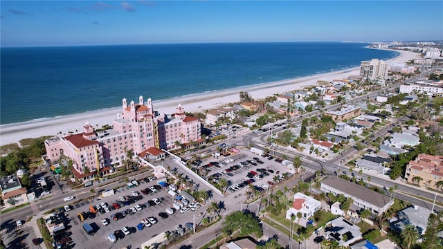 birds eye view of property featuring a view of the beach and a water view