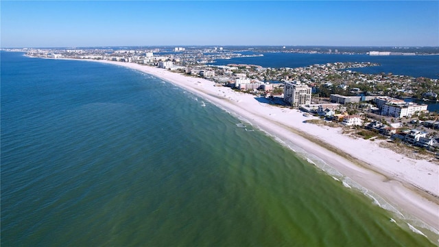 bird's eye view featuring a view of the beach and a water view