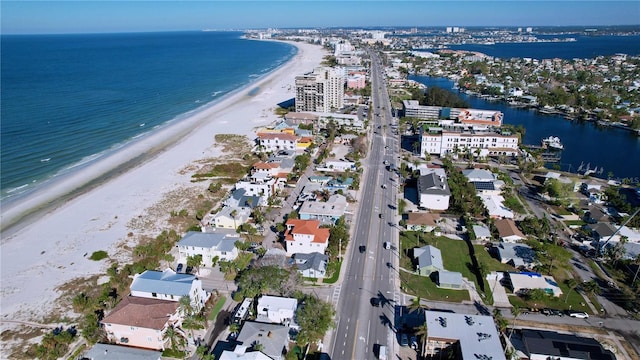 bird's eye view featuring a beach view and a water view