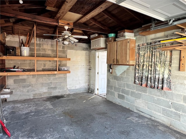 garage featuring concrete block wall