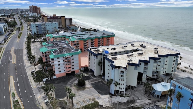 bird's eye view featuring a water view and a view of the beach