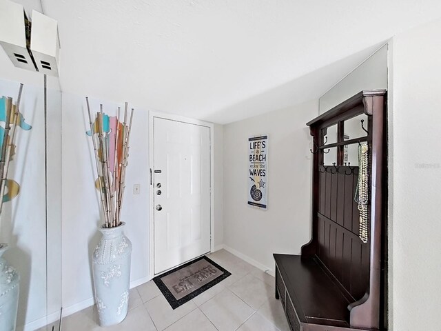 mudroom with light tile patterned floors