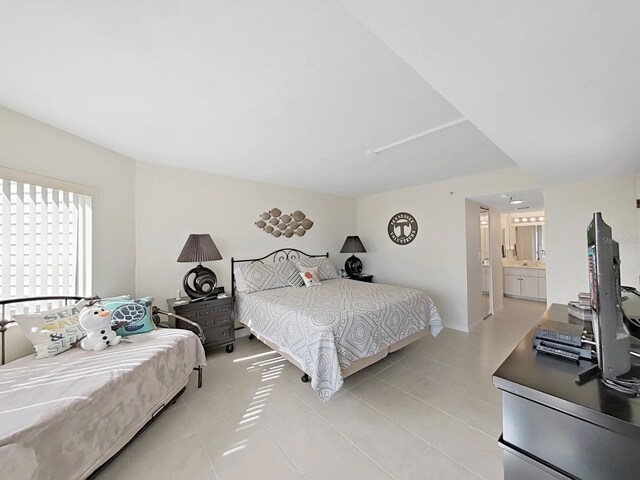 tiled bedroom with ensuite bath