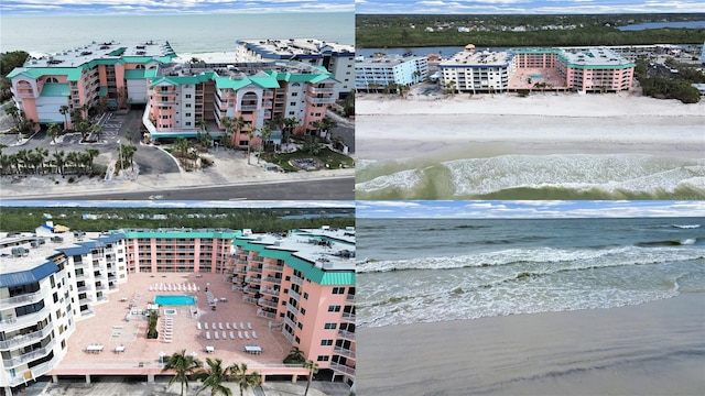 birds eye view of property featuring a water view and a beach view