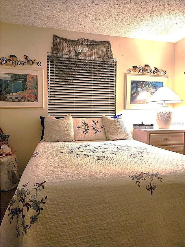 bedroom with a textured ceiling