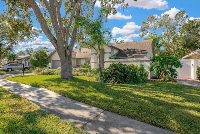 view of front of home featuring a front yard