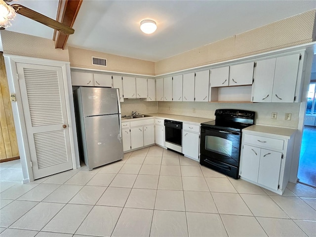 kitchen with sink, white cabinetry, and black appliances