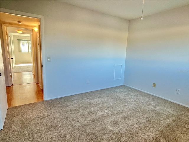 unfurnished room featuring wood-type flooring