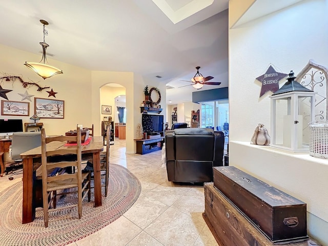 dining room with ceiling fan and light tile patterned flooring