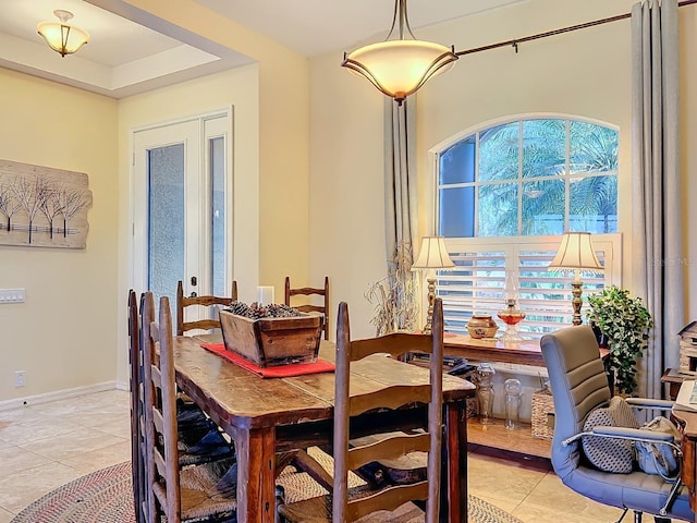 tiled dining space with french doors