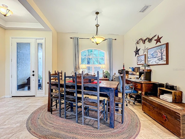 dining room with light tile patterned flooring