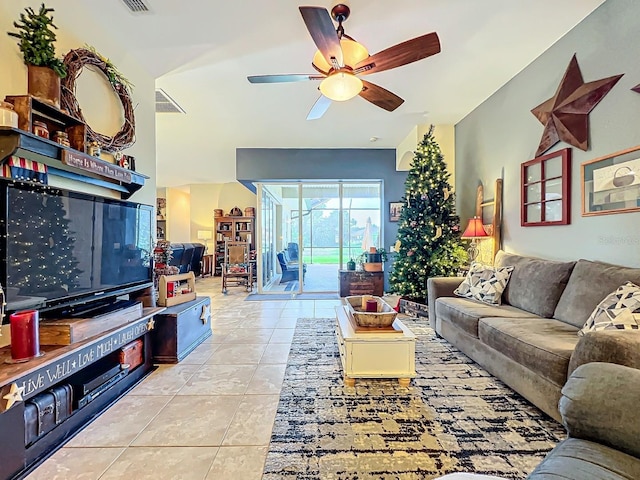 living room with light tile patterned floors and ceiling fan