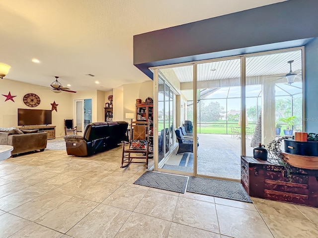 doorway to outside with ceiling fan