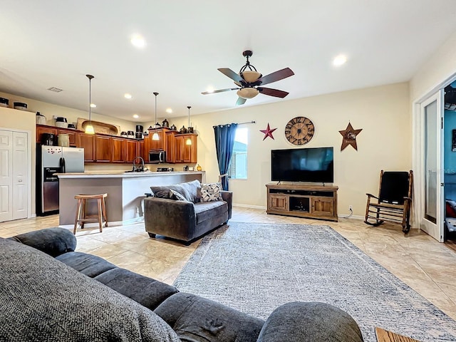 living room with ceiling fan