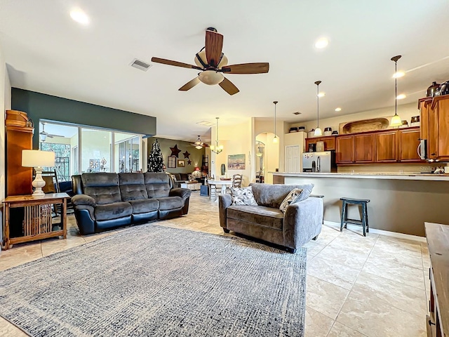 living room with ceiling fan