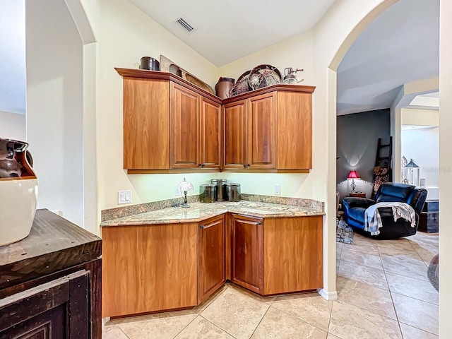 kitchen with light tile patterned floors