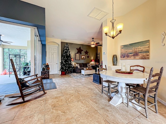2915 126th Ter E, Parrish, FL 34219 - dining room featuring ceiling fan, a chandelier, and baseboards