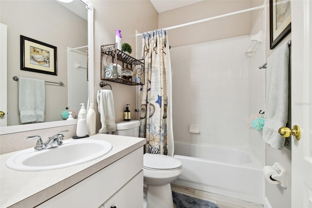 full bathroom featuring tile patterned floors, vanity, toilet, and shower / bathtub combination with curtain